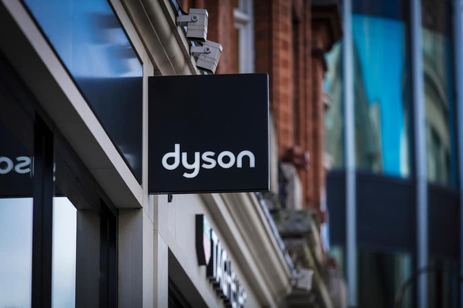 A sign and logo for Dyson store in London